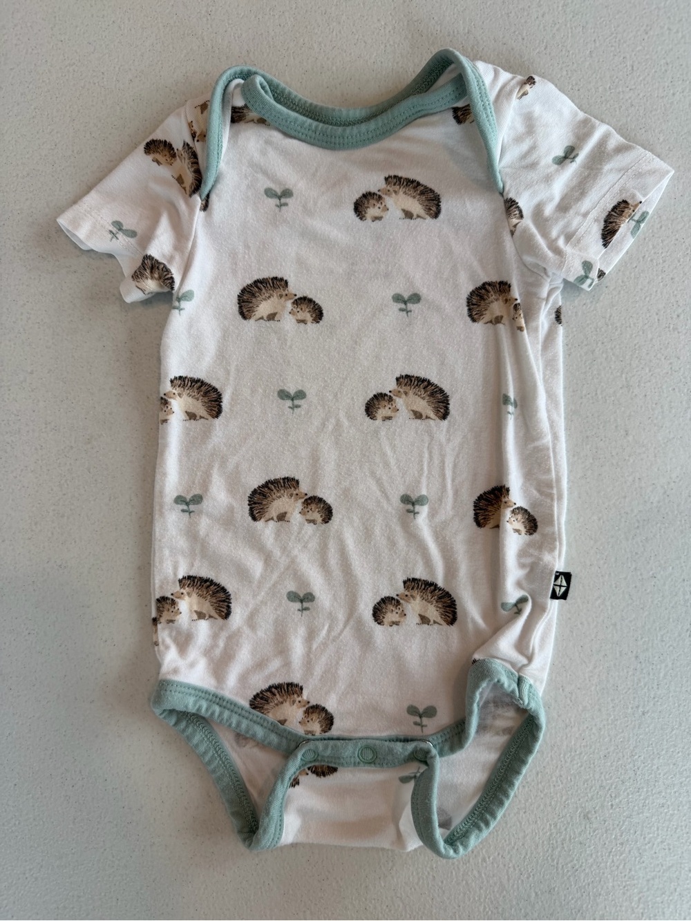 Kyte Baby Hedgehog Bodysuit in White and Sage